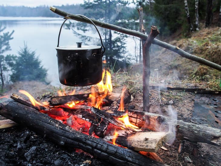 Cooking On The Fire Outdoors For A Camping Trip