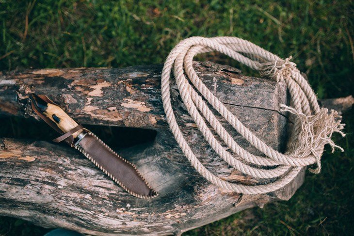 A Boot Knife With Leather Sheath