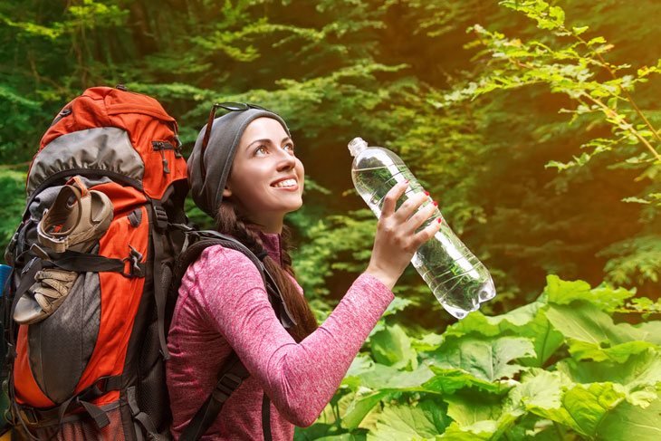 Hiker Girl Happy With Water Bottle