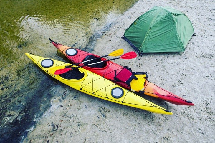 Kayak Camping On The Beach On Sunny Day